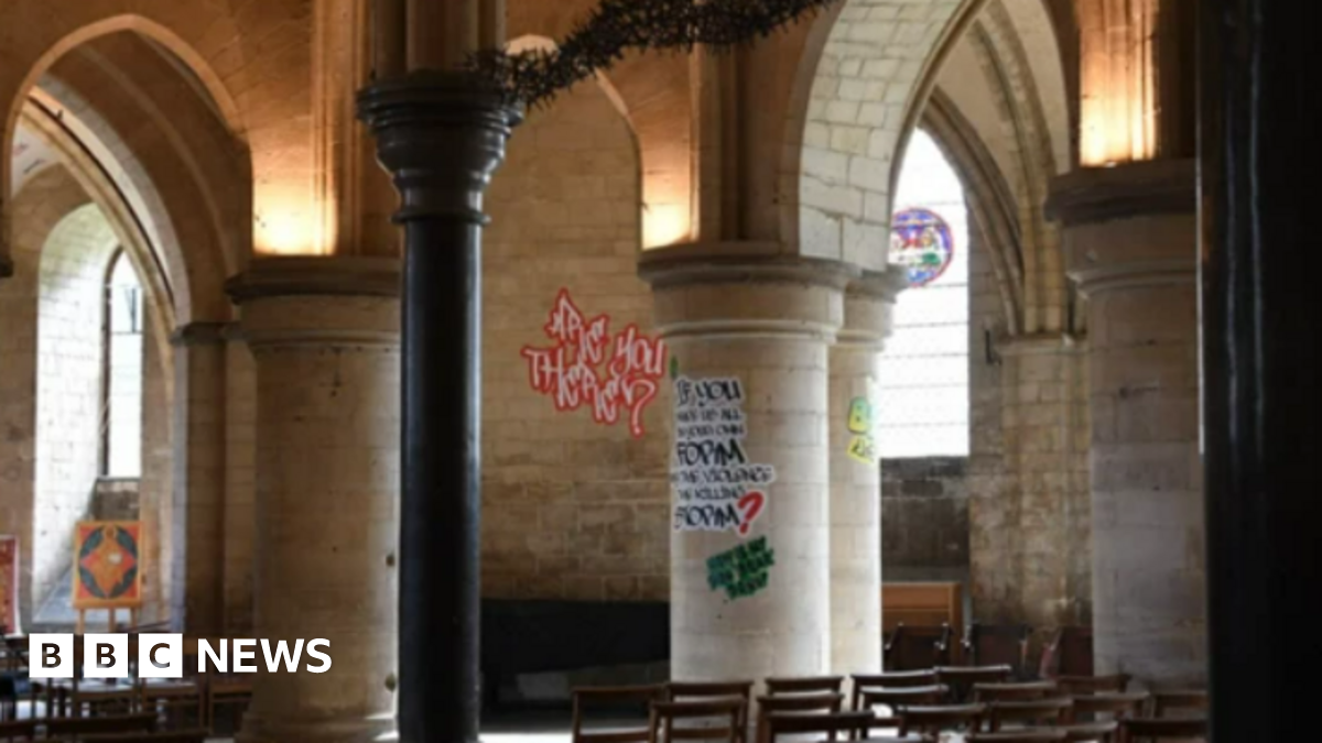 Graffiti written on walls and posts within Canterbury cathedral