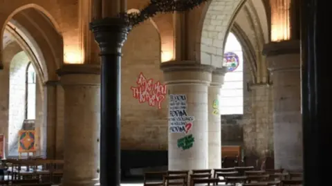 Canterbury Cathedral Graffiti written on walls and posts within Canterbury cathedral