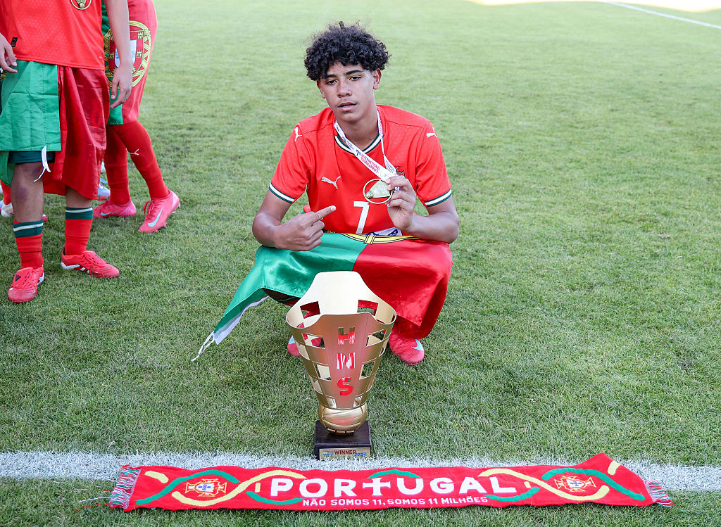 ZAGREB, CROATIA - MAY 18: Cristiano Ronaldo Jr. of Portugal U15 with the Vlatko Markovi International Tournament trophy after winning Vlatko Markovi International Match between Croatia U15 and Portugal U15 at Stadion SRC Mladost on May 18, 2025 in akovec, Croatia. (Photo by Pixsell/MB Media/Getty Images)