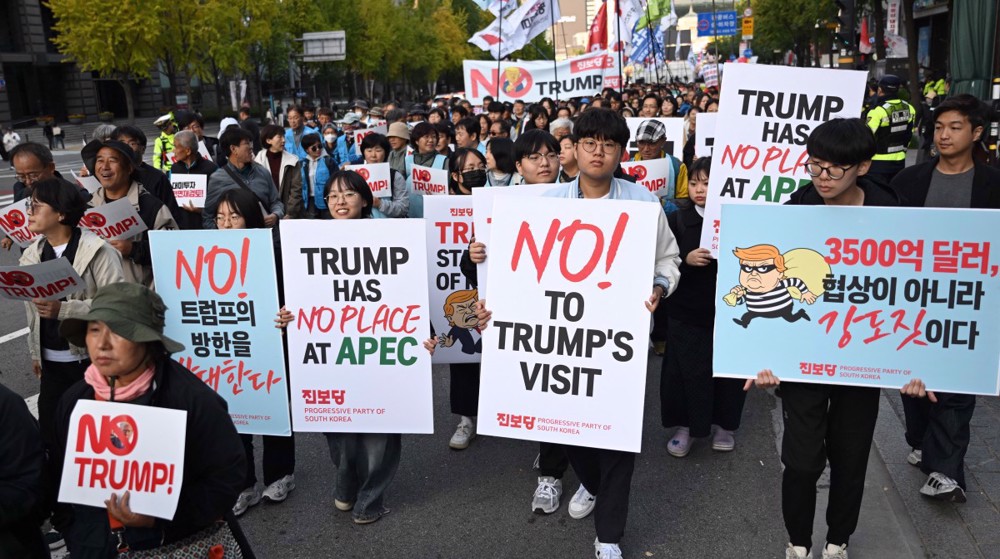 Thousands protest Trump policies in Seoul as summit approaches
