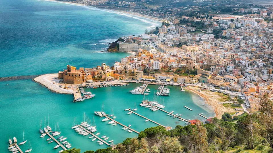 Spectacular aerial cityscape of Castellammare del Golfo town. Popular travel destination of Mediterranean sea. Location: Castellammare del Golfo, Province of Trapani, Sicily, Italy, Europe