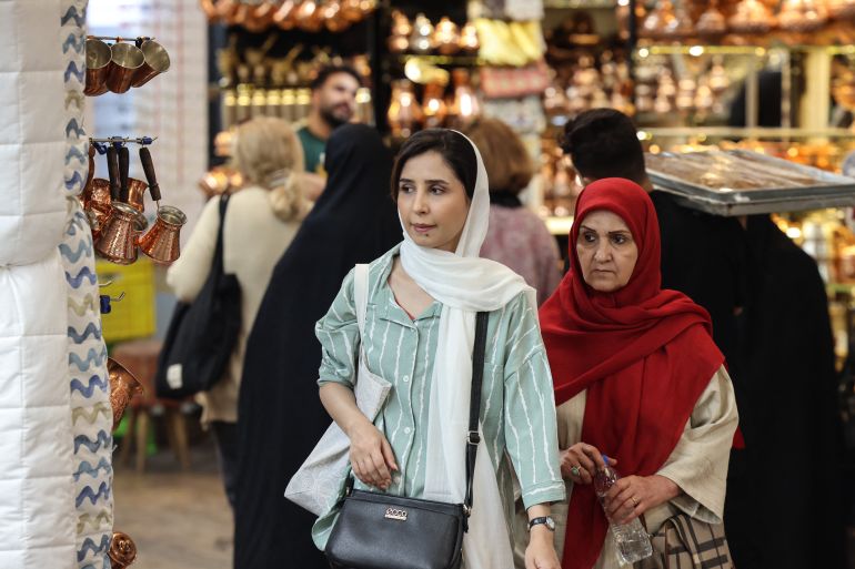 Women shop at Tajrish Bazaar in the Iranian capital Tehran on October 25, 2025.