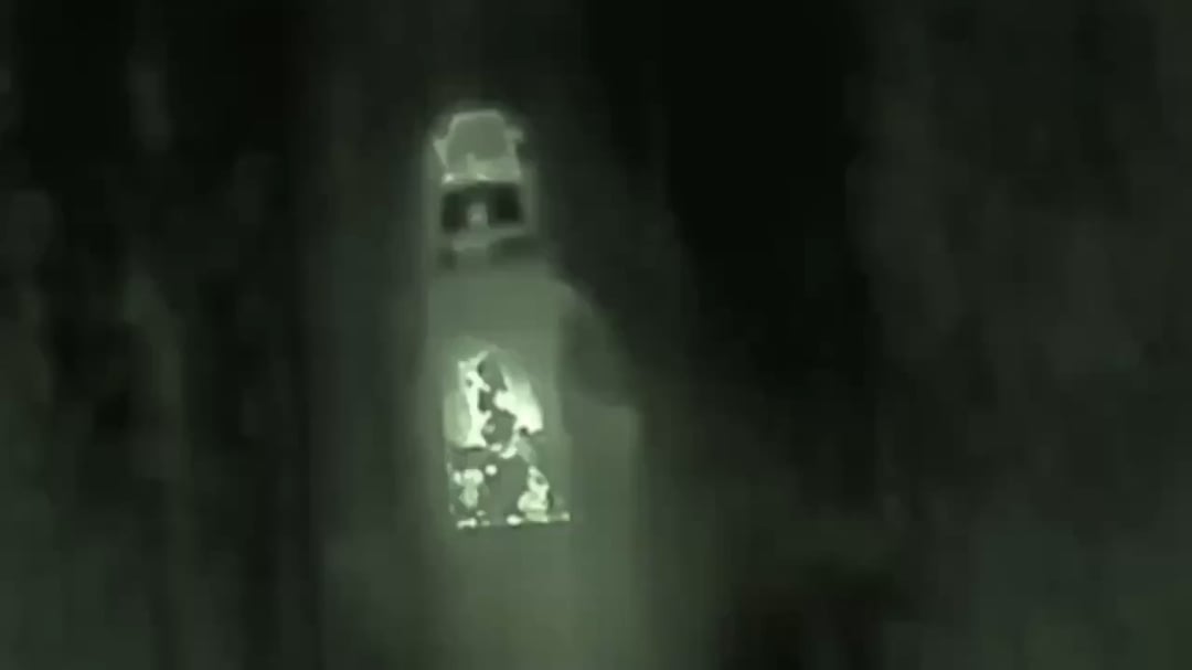 Ukrainian night heavy drone bomber chases and bombs a Russian truck full of Russian infantry