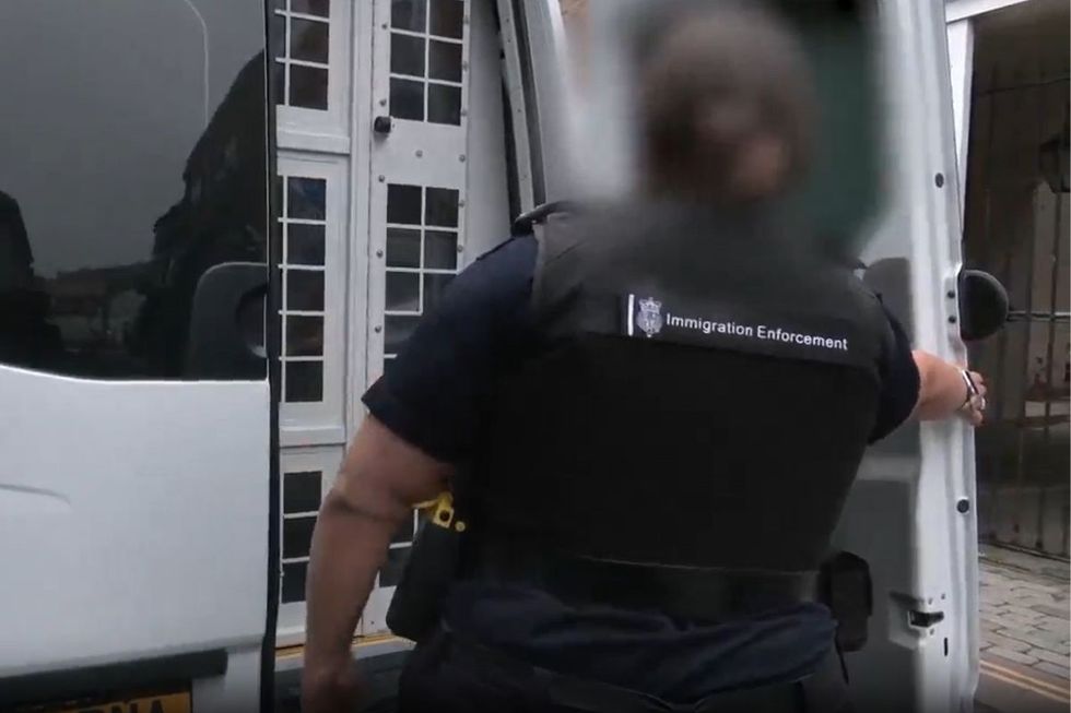 An Immigration Enforcement officer working
