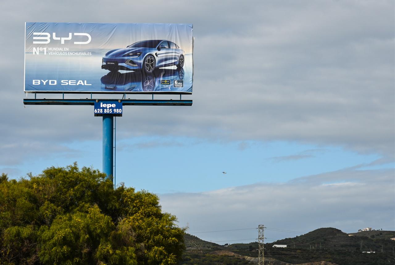A billboard promoting BYD’s all-electric sedan, the BYD Seal, stands along a highway in southern Spain. (Adobe Stock Photo)