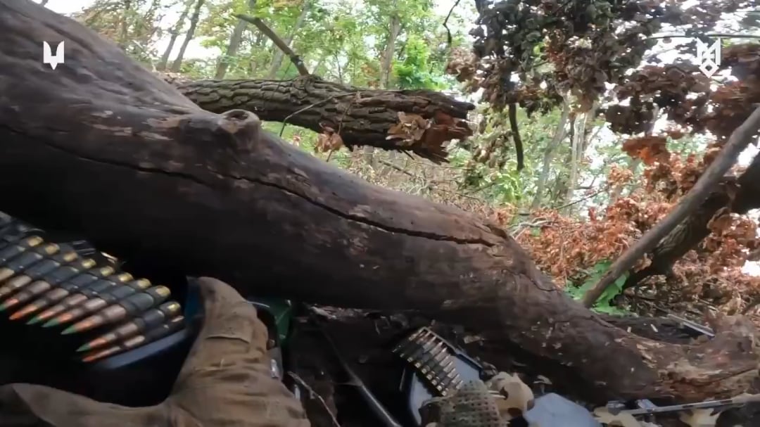 A Ukrainian Micro recon drone spots two russian soldiers hiding in conceilment, their position is relayed to Ukrainian infantry who saturate the area with MG fire, killing the russians. October 2025.