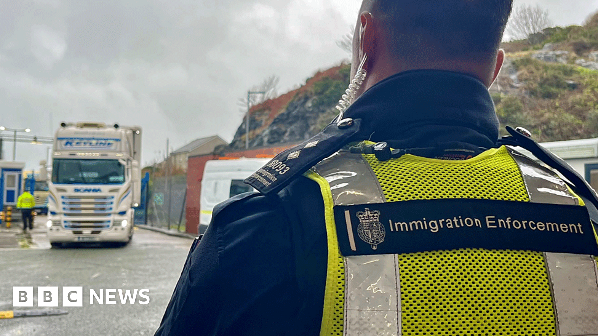 Chief immigration officer Paul Harvey surveys a lorry at a Holyhead Port checkpoint
