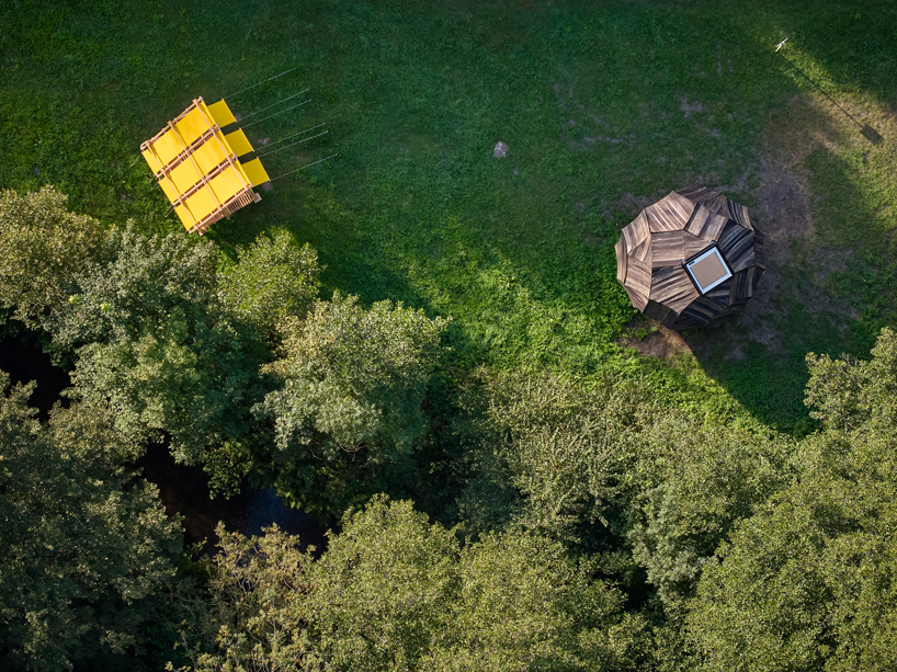from chicken-like shelters to spiky wooden huts, hello wood's cabin fever lands in czechia