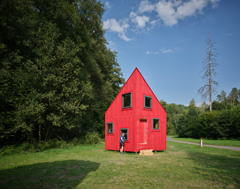 from chicken-like shelters to spiky wooden huts, hello wood's cabin fever lands in czechia