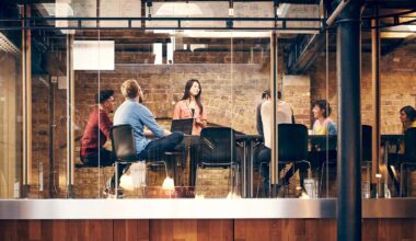 group of people in a meeting room banner