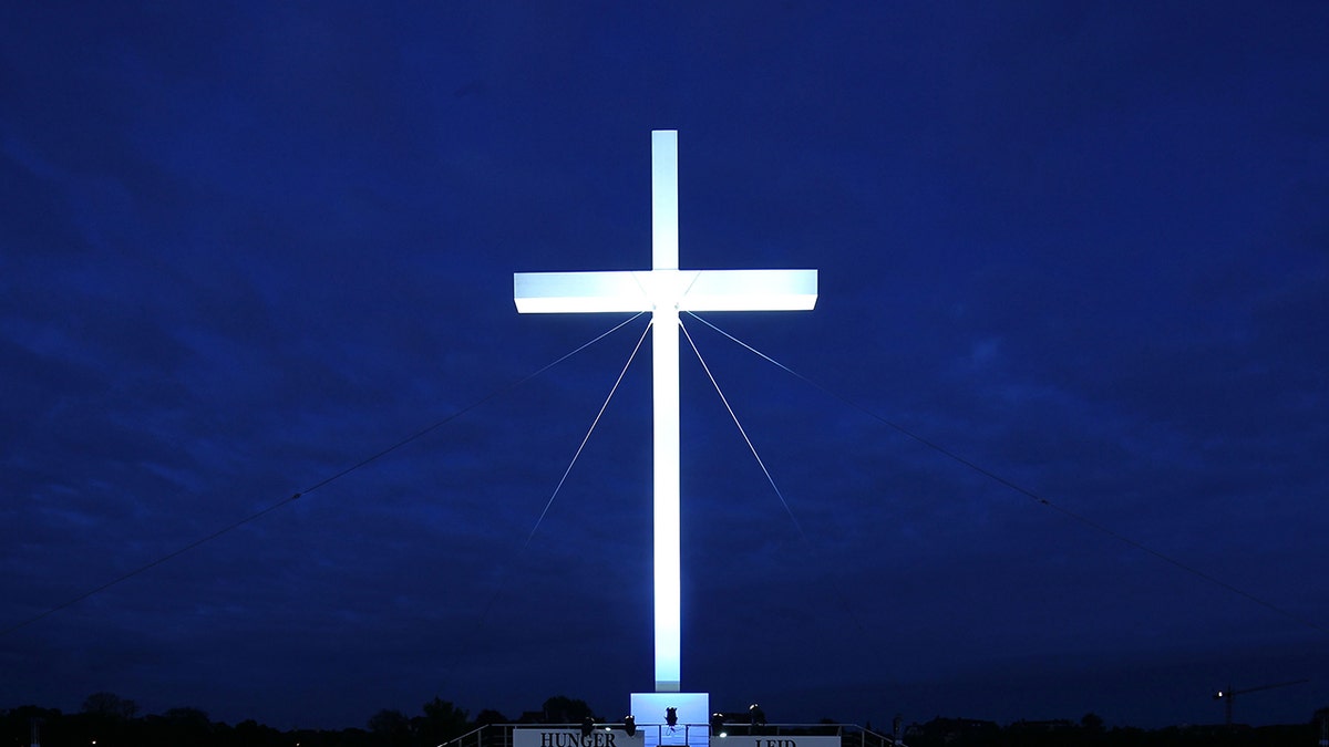 White cross against night sky