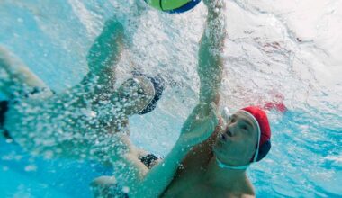 Two young men playing water polo