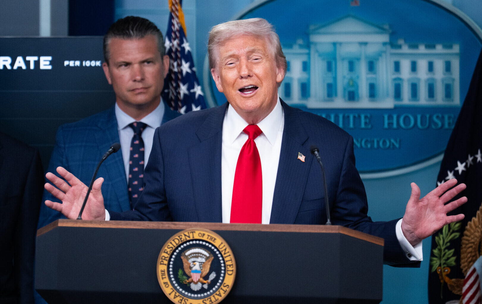 President Donald Trump conducts a news conference in the White House briefing room on Aug. 11. Defense Secretary Pete Hegseth also appears.