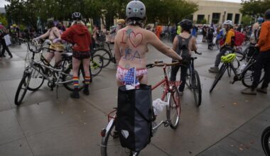 Naked bike riders demonstrate against federal troops in 'quintessentially Portland' protest
