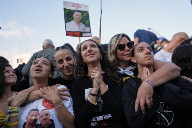 People react in anticipation of the release of Israeli hostages...