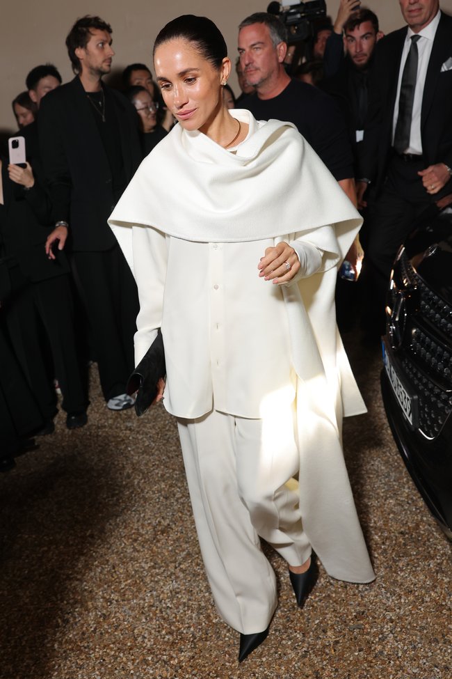The royal cut a stylish figure in an all-white ensemble for the Balenciaga show. 