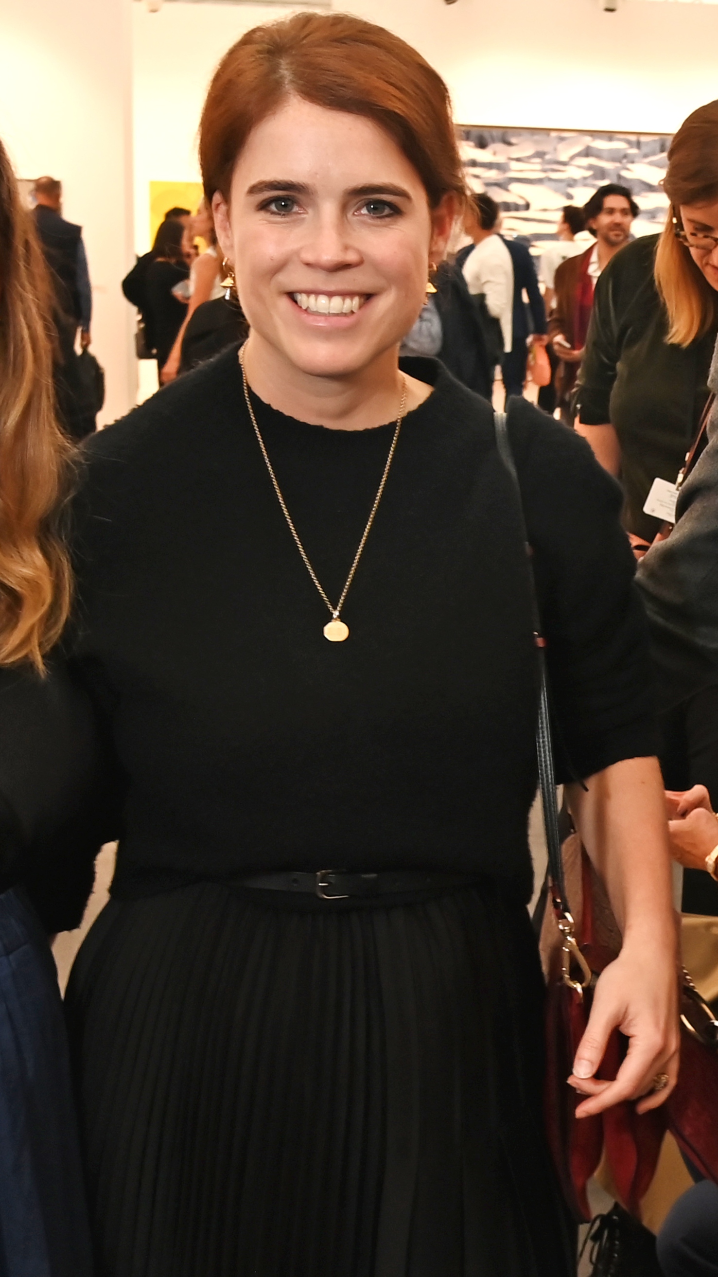 Princess Eugenie of York smiles for a photo as she attends the Frieze Art Fair 2025 VIP preview in Regents Park on October 15, 2025