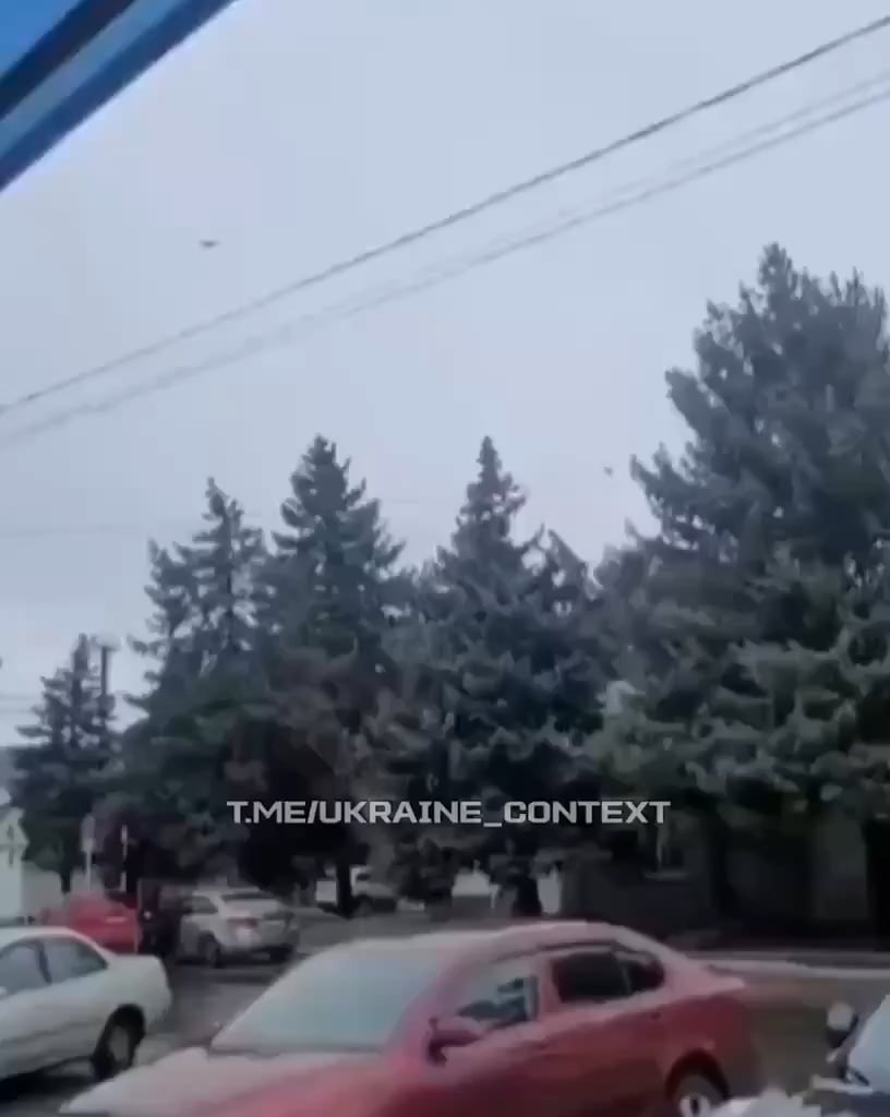 Russian civilians are filming incoming Ukrainian UAVs and the attack on the oil depot in Matveev Kurgan, Rostov Oblast.