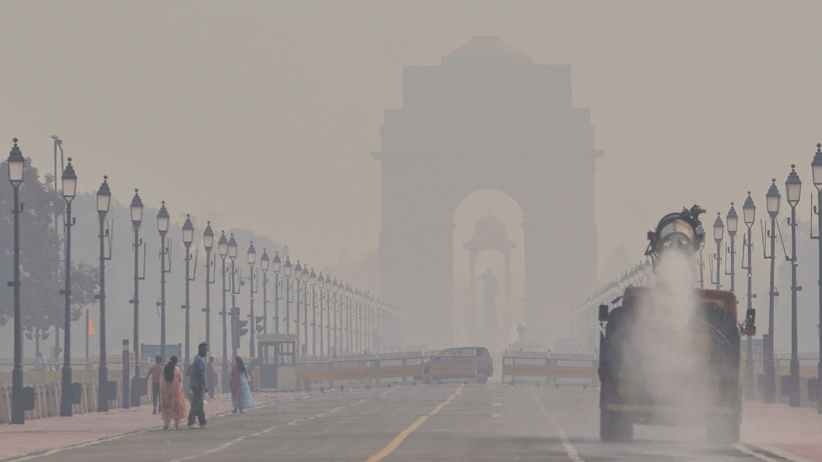 Dust and smoke covers the air along a riverbank in New Delhi. (Photo by Reuters)