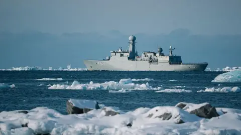 Bloomberg via Getty Images The Royal Danish Navy Thetis-class warship HDMS Vaedderen sails past sea ice off the coast of Nuuk, Greenland, on Wednesday, April 2, 2025. 