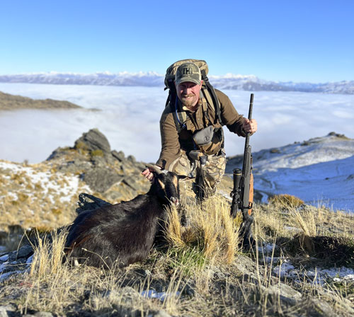 Draper with goat