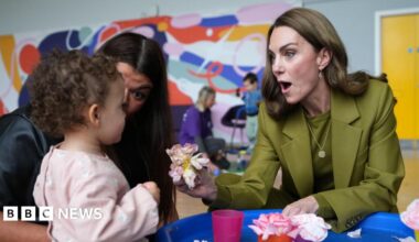 The Princess of Wales interacts with a child during a visit to Home-Start in Oxford.