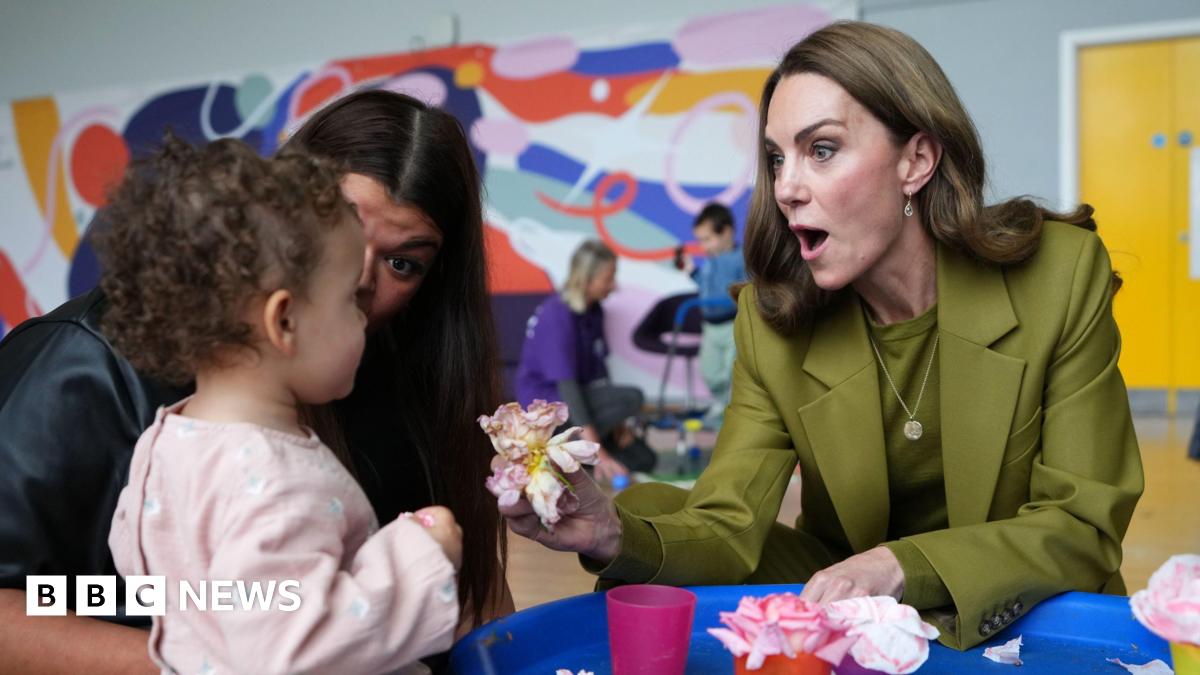 The Princess of Wales interacts with a child during a visit to Home-Start in Oxford.