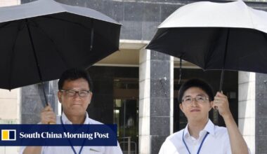 Japanese men drop gender norms to pick up parasols amid record heatwave