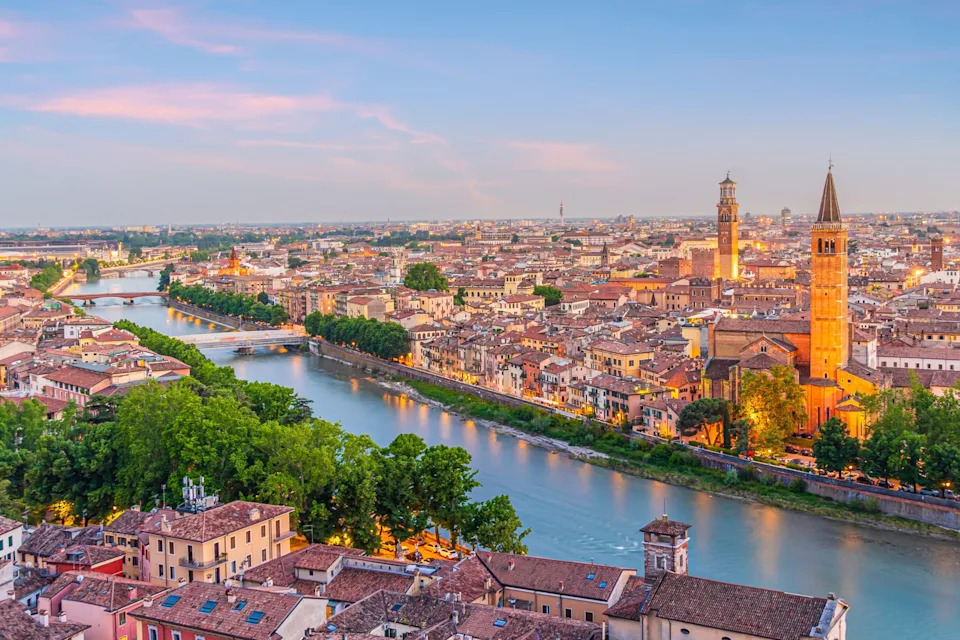 Verona city downtown skyline, cityscape of Italy at sunset