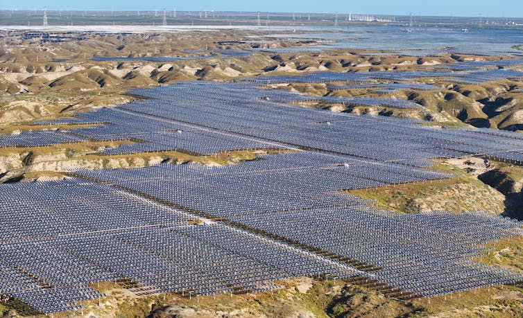 An aerial shot of a a huge swathe of solar panels in China.