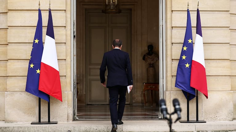 French outgoing Prime Minister Sebastien Lecornu, who resigned just a day after naming his government, walks back after delivering his statement at the Hotel Matignon in Paris.