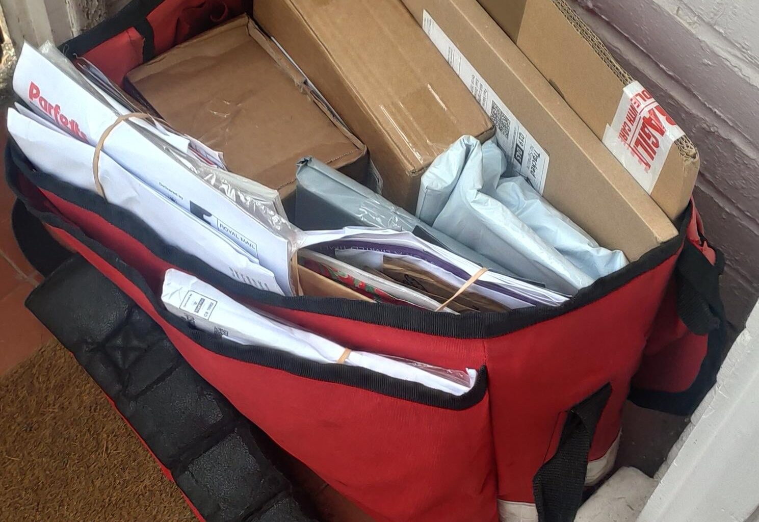 Postman just left his bag in our porch and we can't find him.