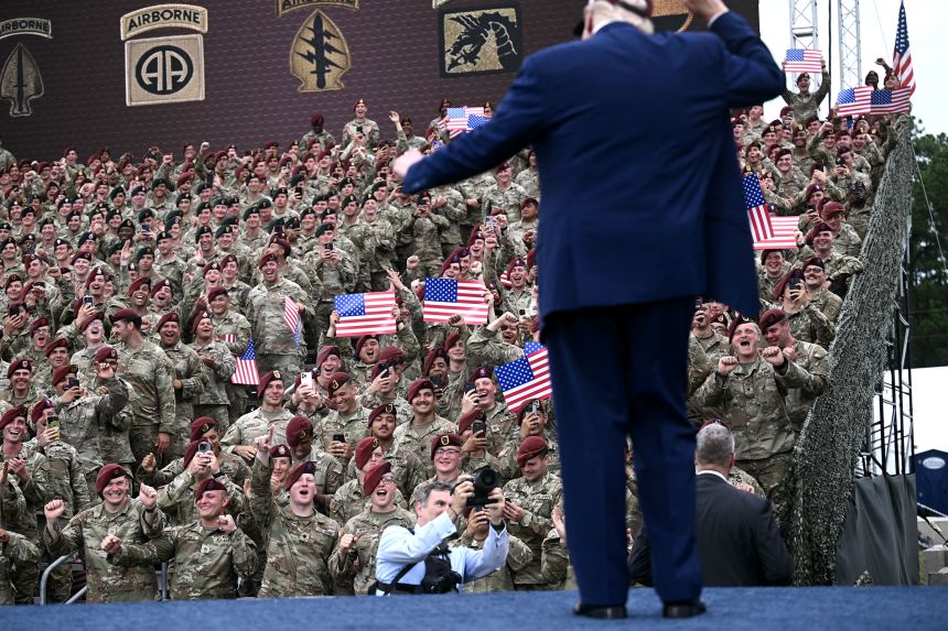 Members of the Army cheer as President Donald Trump dances before speaking at Fort Bragg, a US Army military installation near Fayetteville, North Carolina, on June 10, 2025.