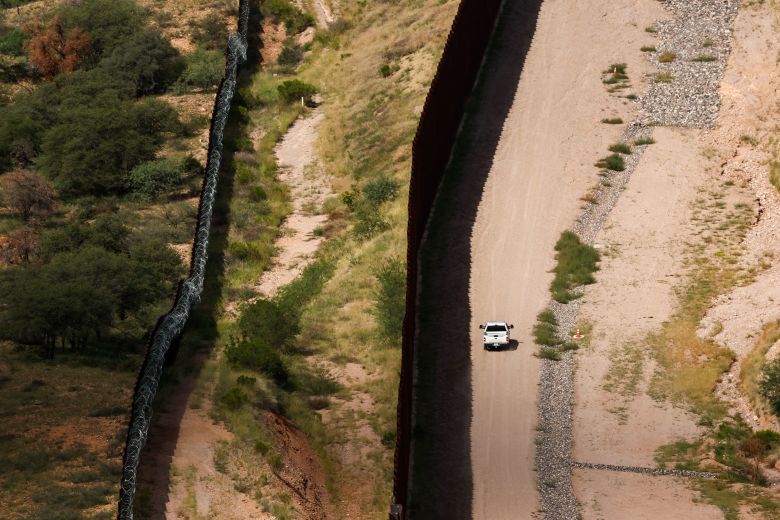 A US Customs and Border Protection vehicle patrols along the US-Mexico border in Nogales, Arizona, on September 17.