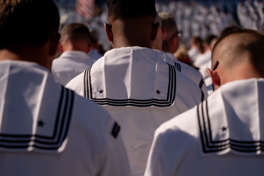 Members of the US Navy during a celebration for the Navy's 250th anniversary with President Donald Trump at Naval Station Norfolk in Virginia, on October 5, 2025.