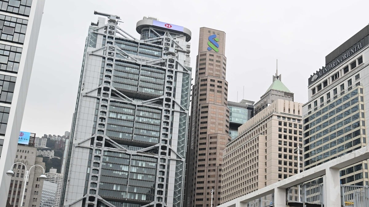 The HSBC building (centre L) is seen in Hong Kong on February 19, 2025, ahead of their annual results announcement. (Photo by Peter PARKS / AFP)