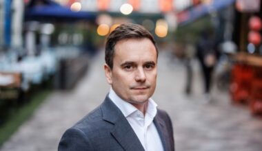 Richard Walker stands outdoors in central London.