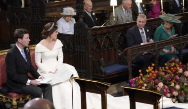 WINDSOR, ENGLAND - OCTOBER 12: Princess Eugenie and her husband Jack Brooksbank, look back towards the Duke of York and Sarah, Duchess of York (seated front) and Queen Elizabeth II, the Duke of Edinburgh, Prince of Wales, the Duke and Duchess of Cambridge, and the Duke and Duchess of Sussex, during their wedding at St George's Chapel in Windsor Castle on October 12, 2018 in Windsor, England. (Photo by Danny Lawson - WPA Pool/Getty Images)