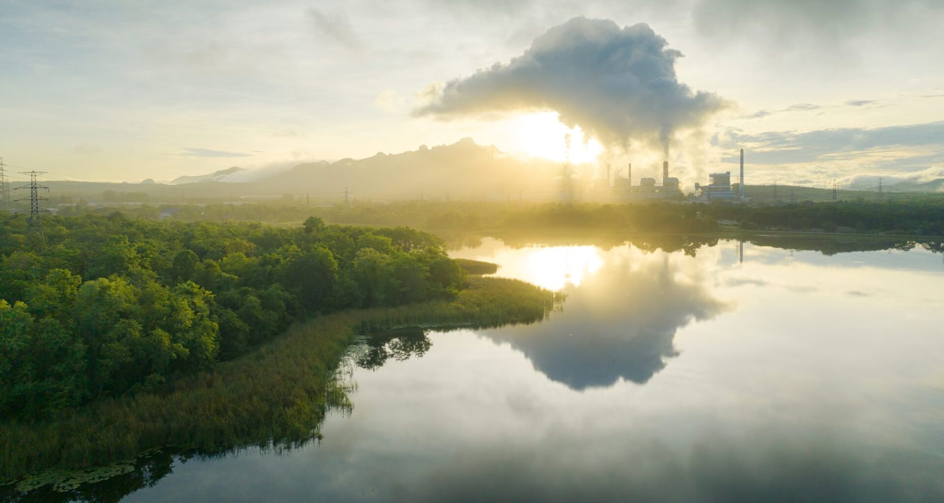 Aerial view coal power plant station in the morning mist.