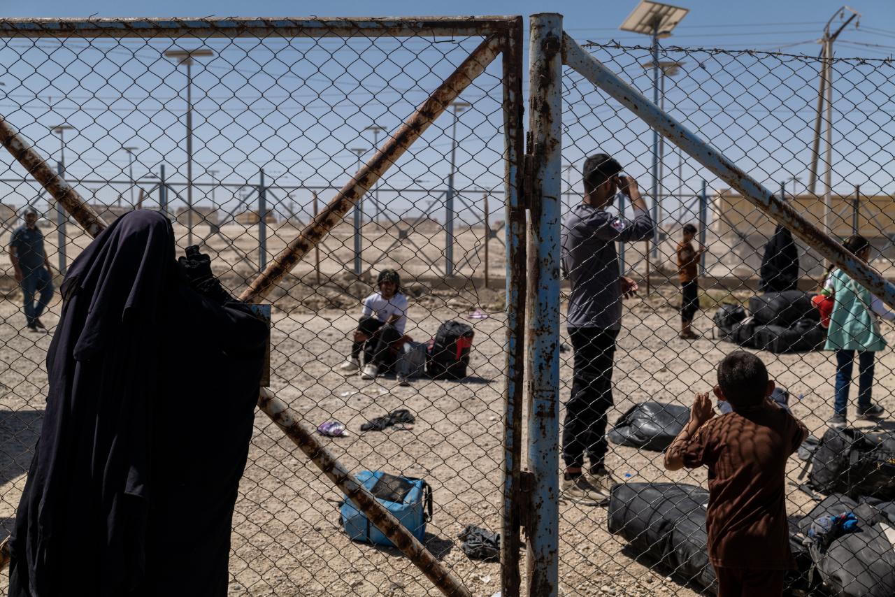 Iraqi families associated with Islamic State waited to be repatriated from a camp in northeast Syria. Iraqi families associated with Islamic State waited to be repatriated from a camp in northeast Syria.