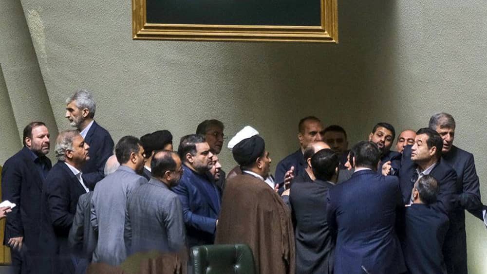 FILE PHOTO: Lawmakers engage in a physical altercation in Iran’s parliament amid rising factional tensions.