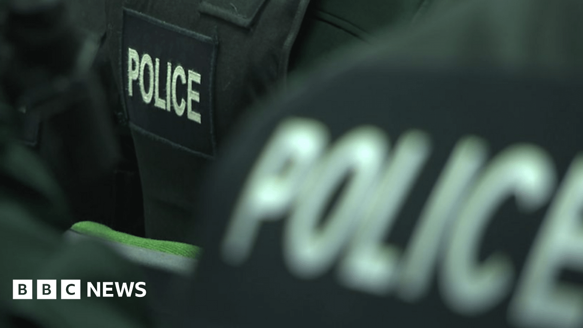 Bilingual street sign damaged with angle grinder