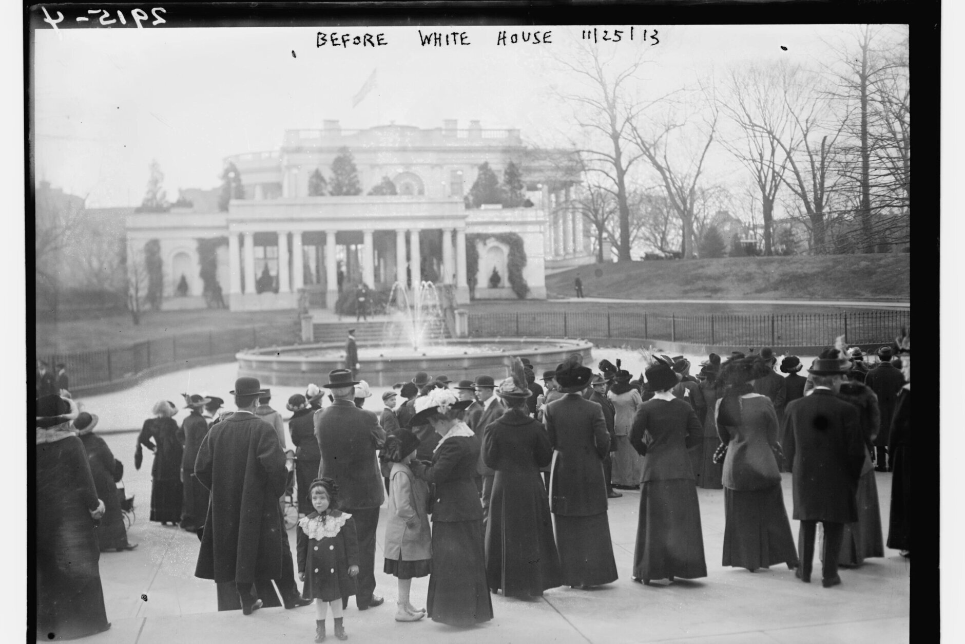 This photo provided by the U.S. Library of Congress shows a crowd outside the White House on the wedding day of Jessie Woodrow Wilson, daughter of President Wilson who married Francis Bowes Sayre, in a White House ceremony in Washington, Nov. 25, 1913.