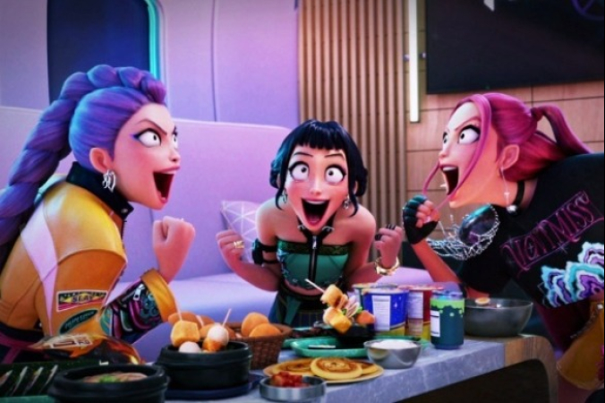 Huntr/x, the girl group from KPop Demon Hunters, shouting over a Korean food table (Courtesy of Netflix)