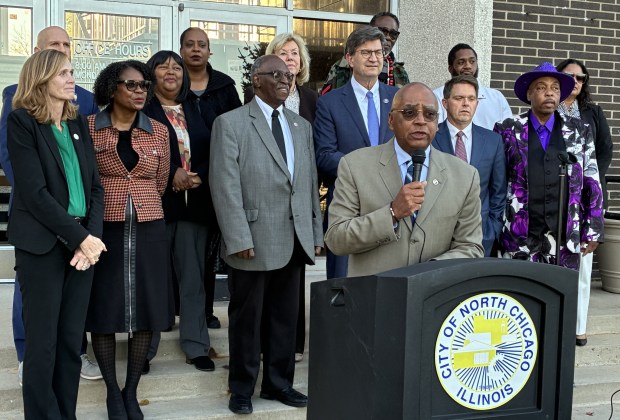 Talking about his first-ever executive order aimed at federal immigration enforcement efforts, North Chicago Mayor Leon Rockingham Jr. is backed by federal, state and local officials. (Steve Sadin/'For the Lake County News-Sun)
