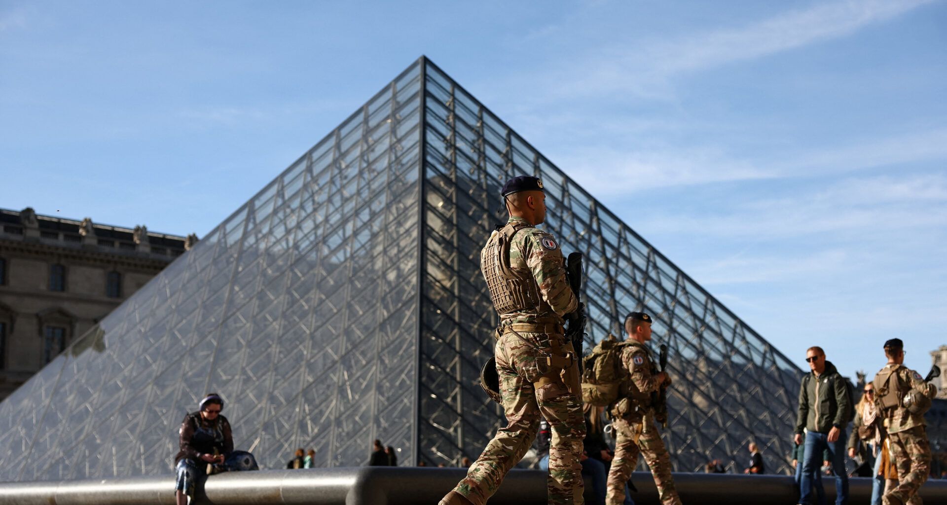 cover French police hunting stolen Louvre jewels arrest more suspects