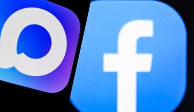 MAX and Facebook logos on a smartphone