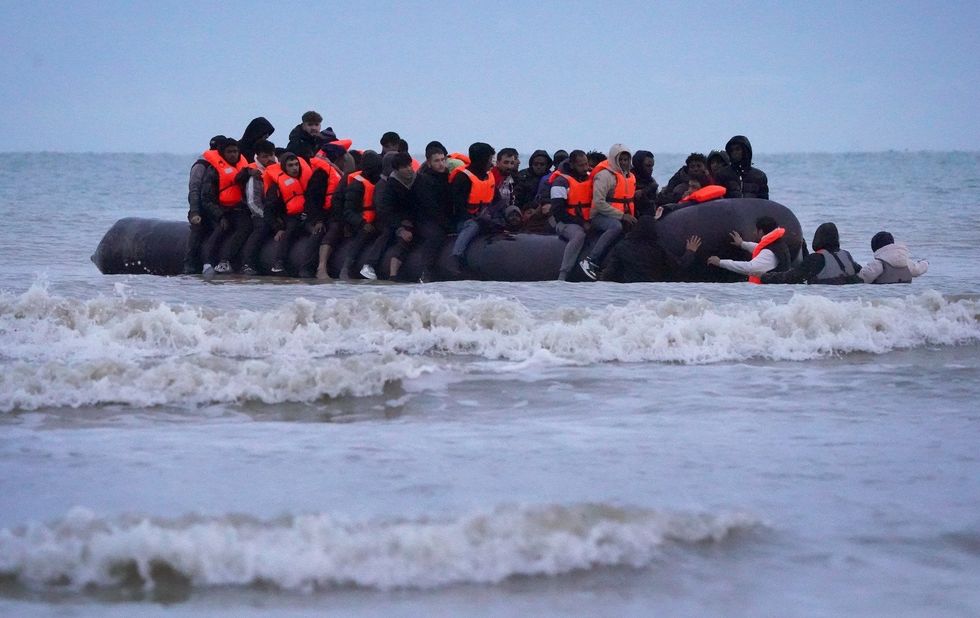 Migrants crossing the Channel on a small boat
