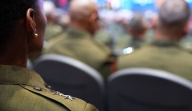 U.S. military senior leadership listen as President Donald Trump speaks at Marine Corps Base Quantico, Tuesday, Sept. 30, 2025 in Quantico, Va. (AP Photo/Evan Vucci)