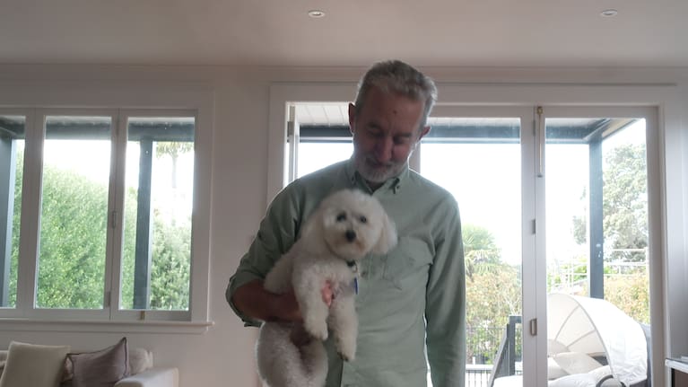 Nigel with his beloved dog in 2024